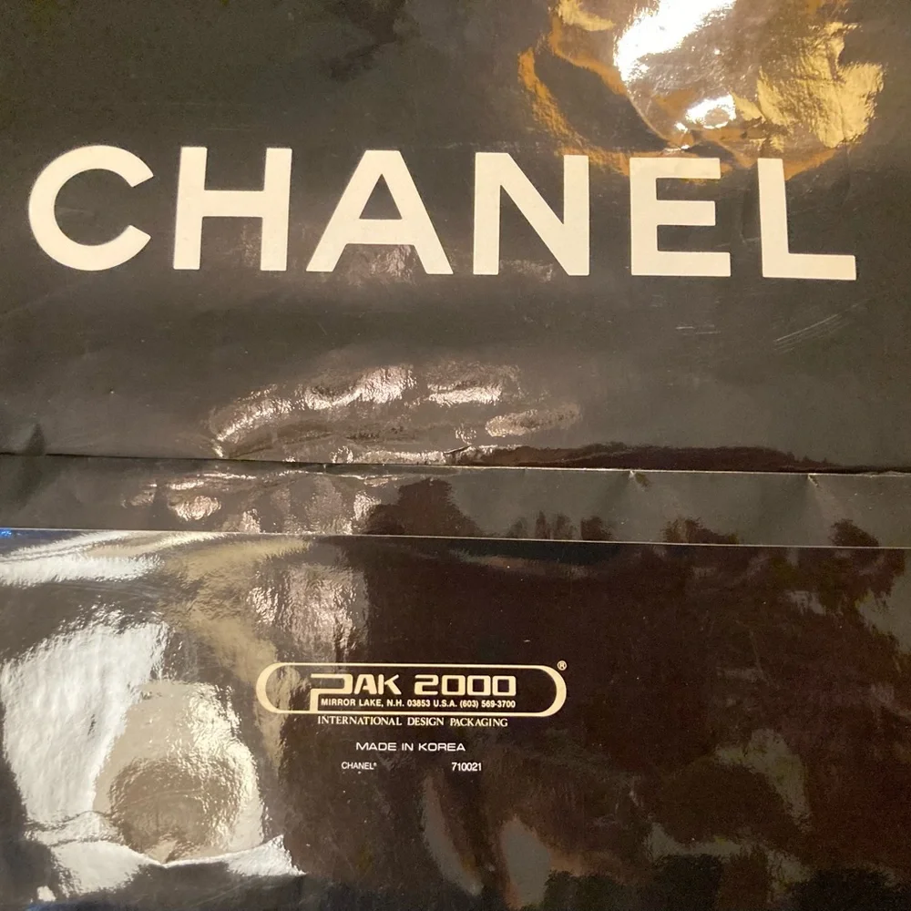Chanel, high gloss glazed paper bag in black with White Chanel block letters